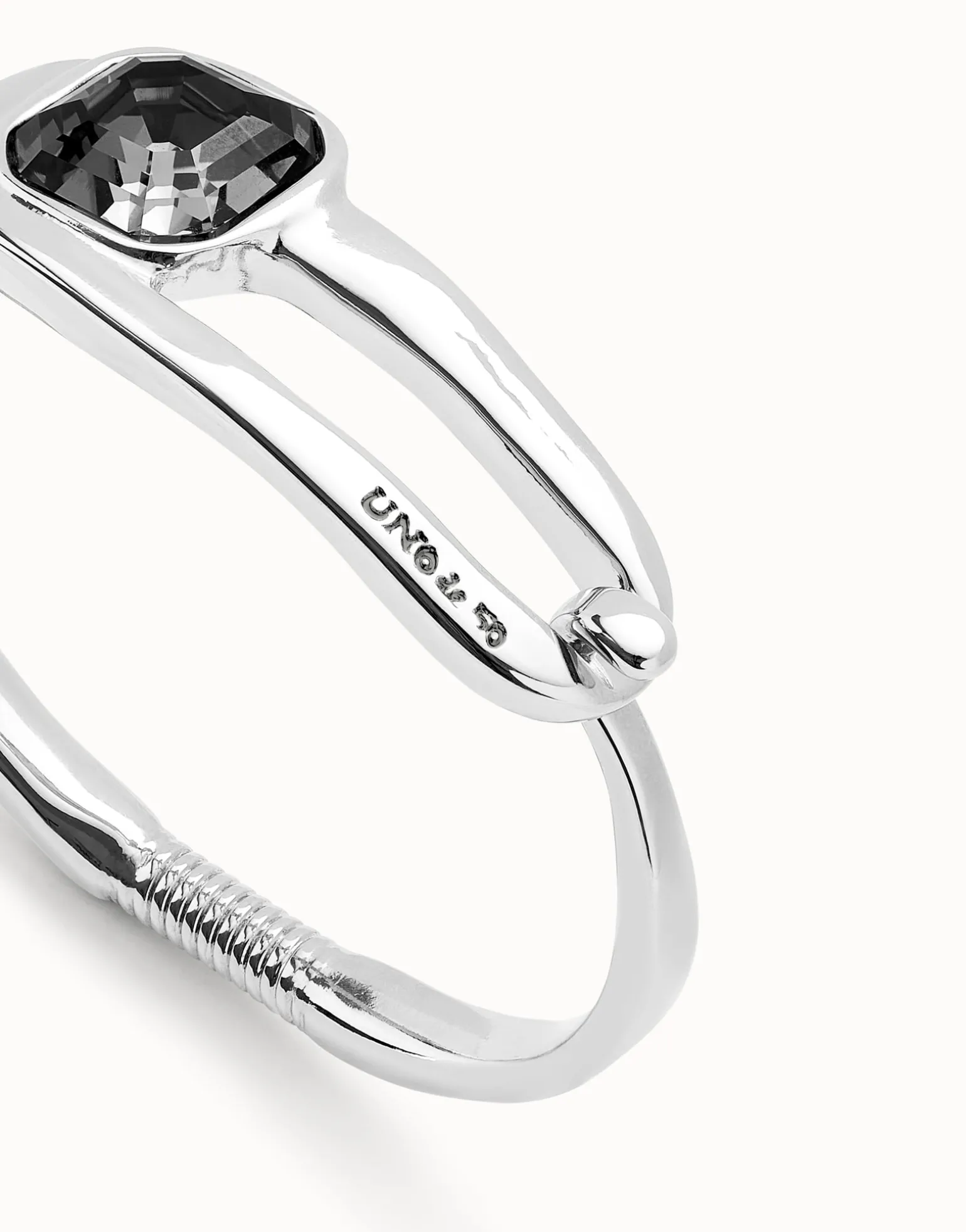 Bangle bracelet with a black crystal