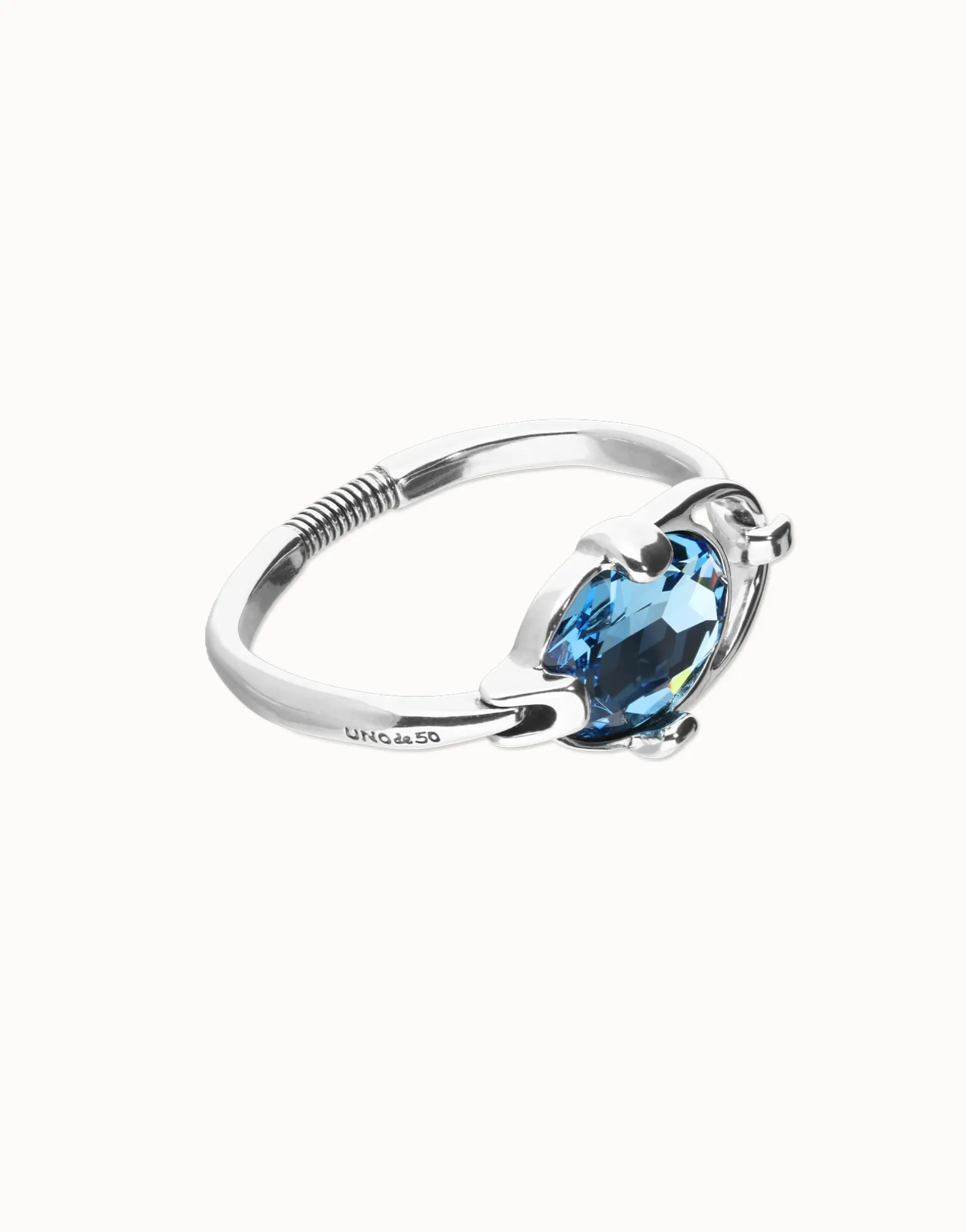 Bangle bracelet with faceted blue crystal