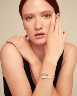 Bangle bracelet with inner spring