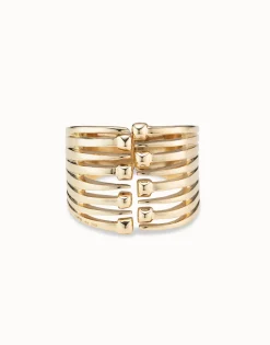 Bangle bracelet with multiple nail heads