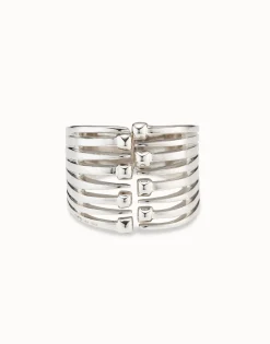 Bangle bracelet with multiple nail heads