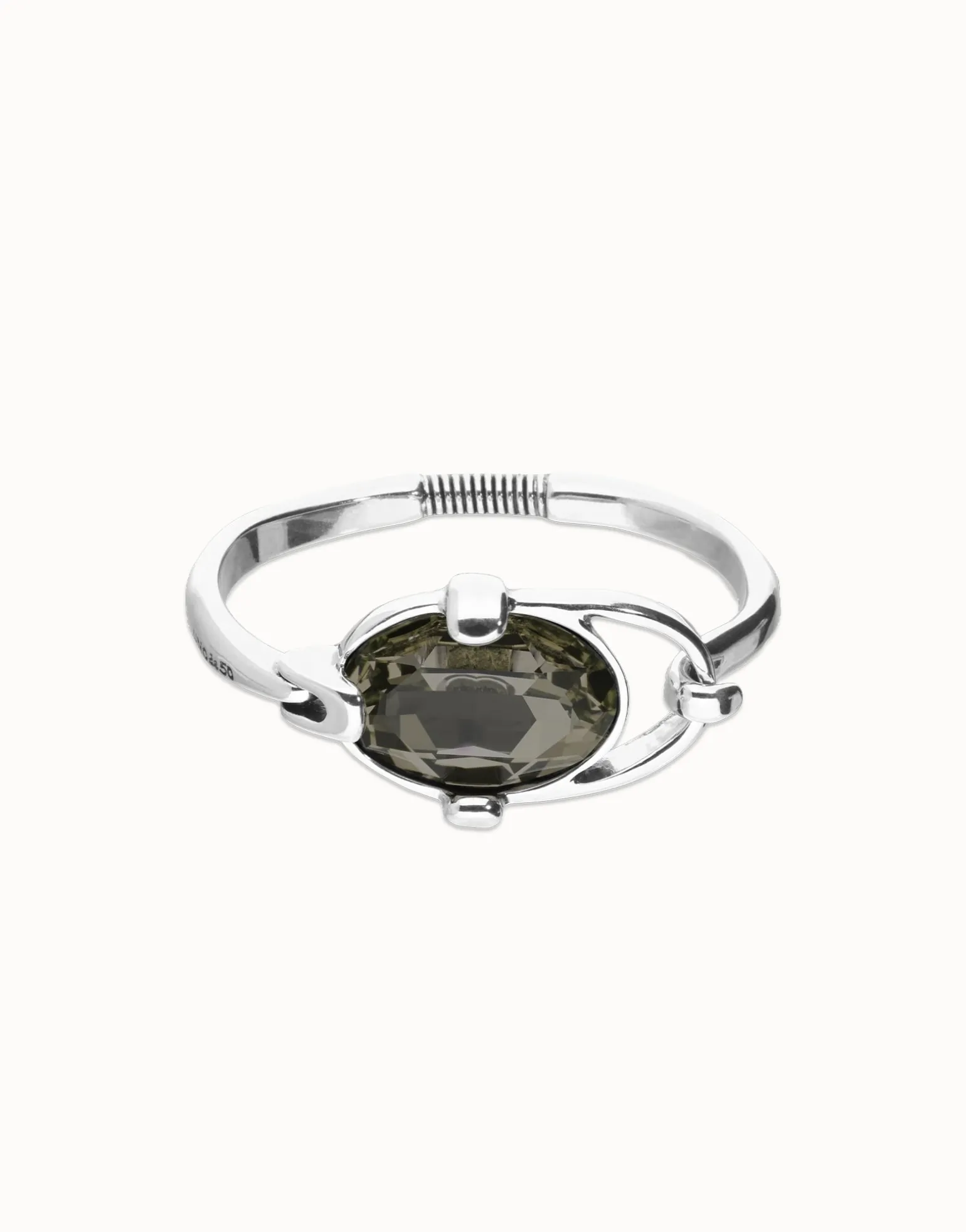 Bangle bracelet with oval faceted gray crystal