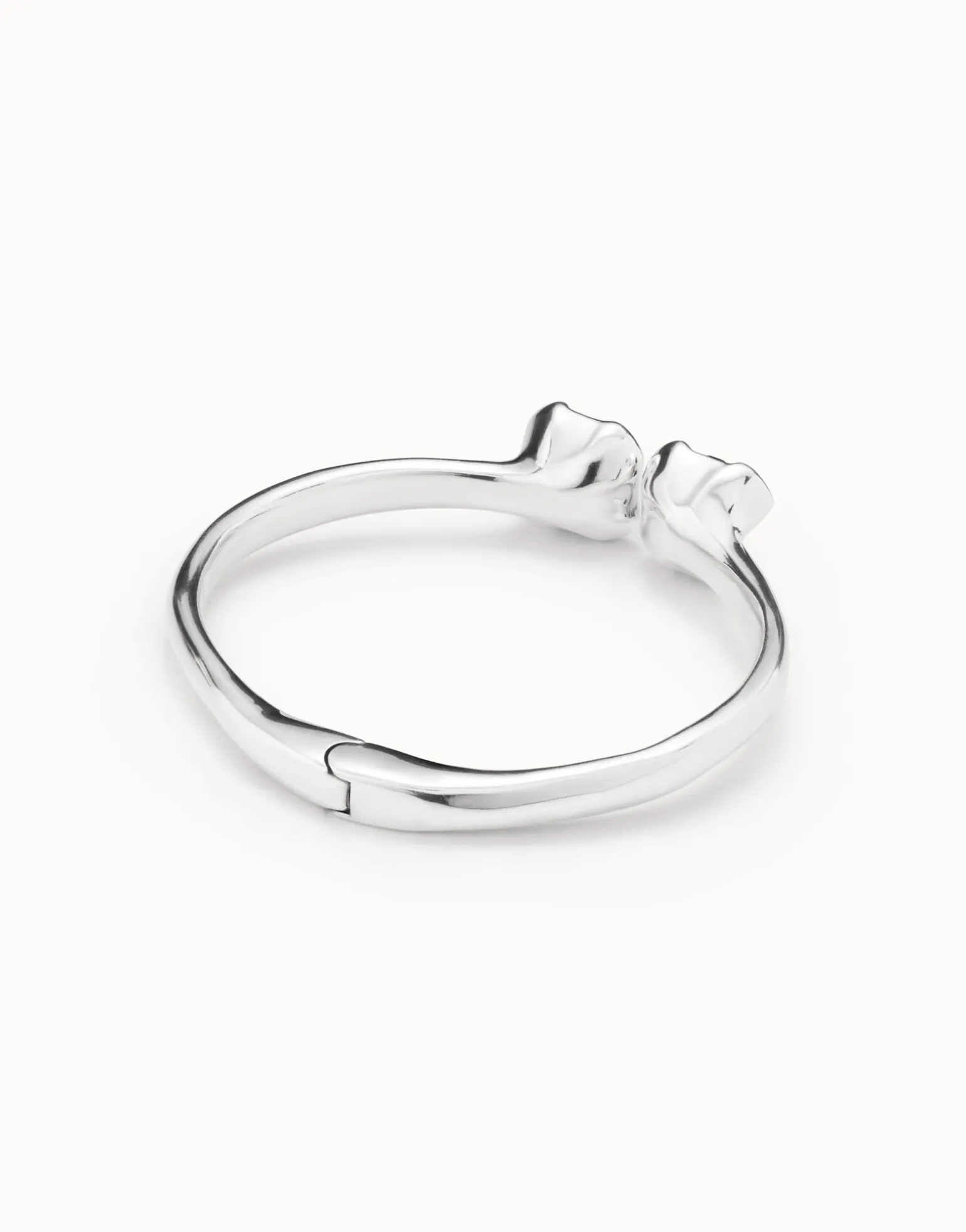 Bangle bracelet with two blue crystals