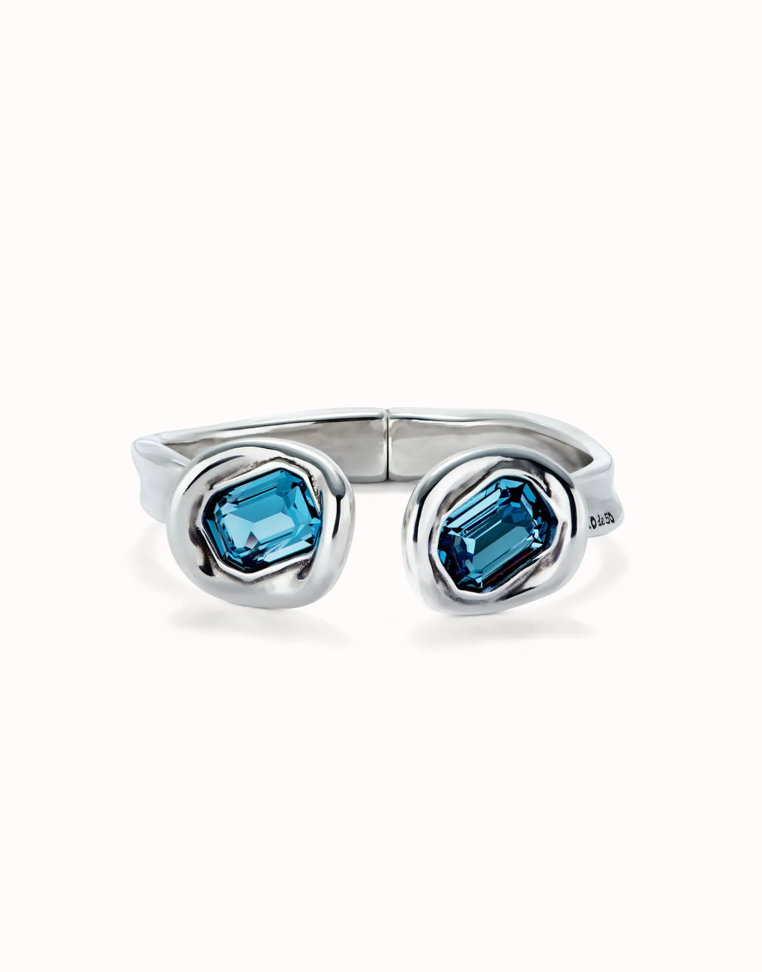 Bangle bracelet with two blue crystals