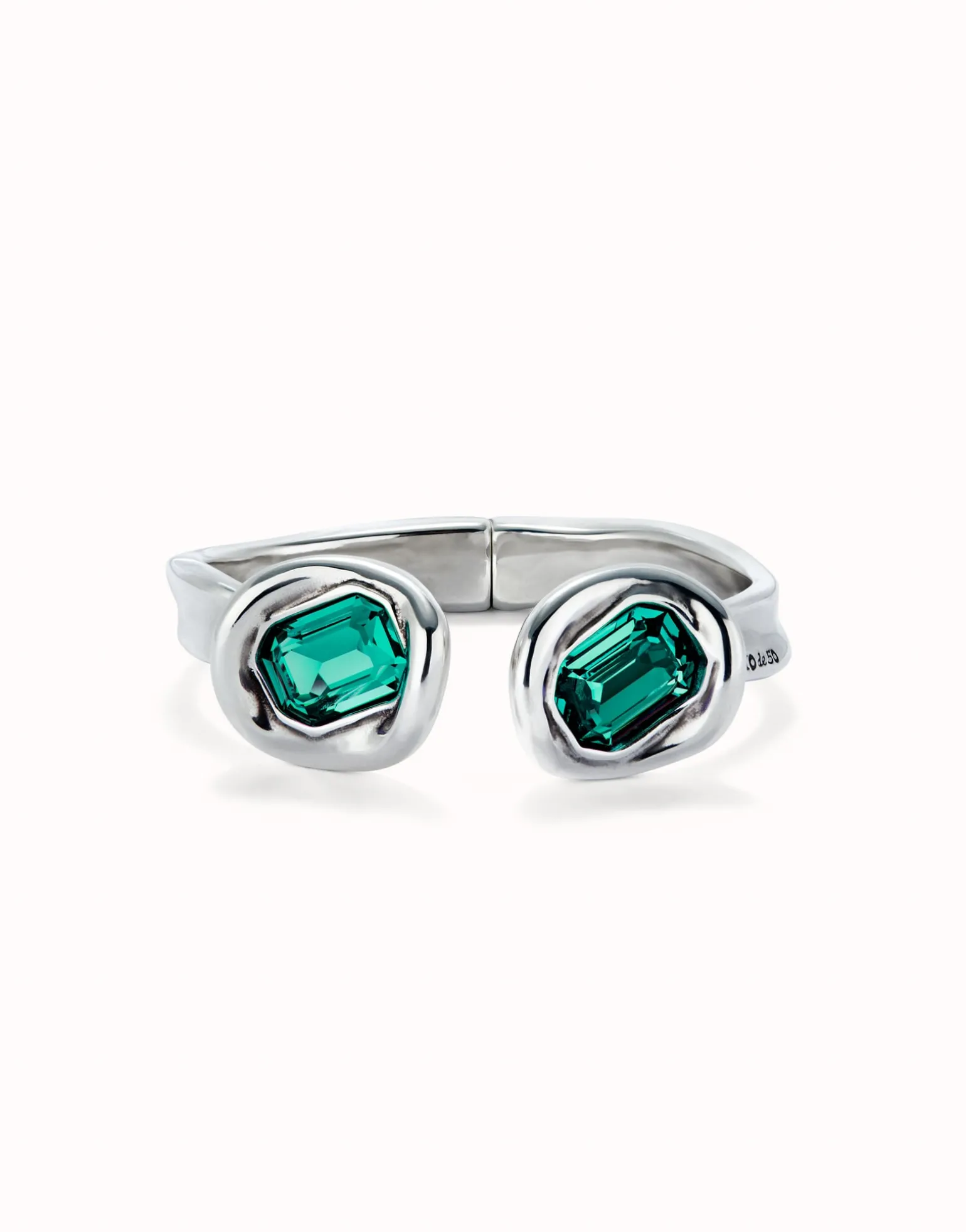 Bangle bracelet with two green crystals