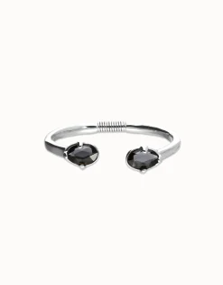 Bangle bracelet with two oval faceted black crystals