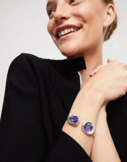 Bangle bracelet with two purple crystals