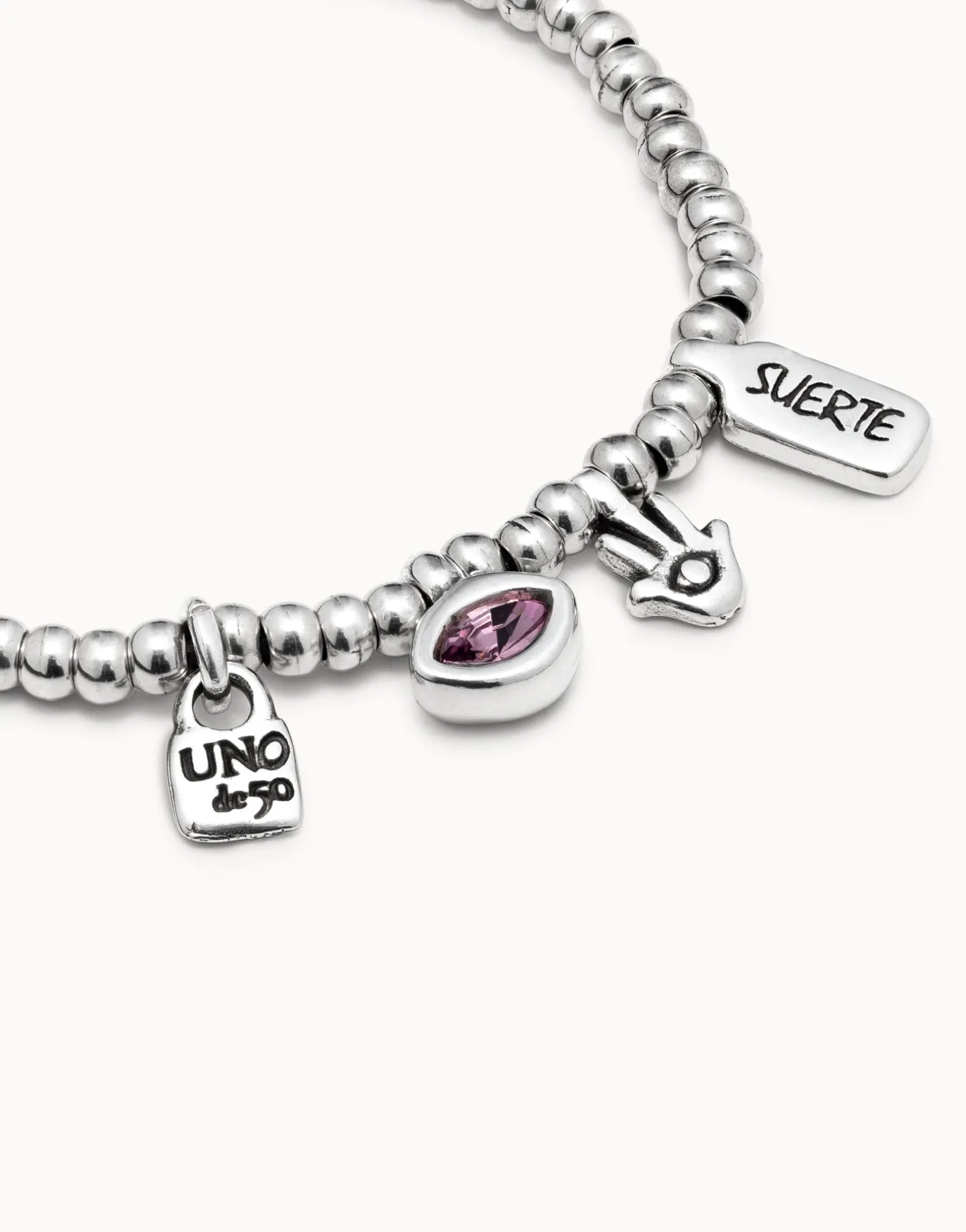 Beaded bracelet with charms