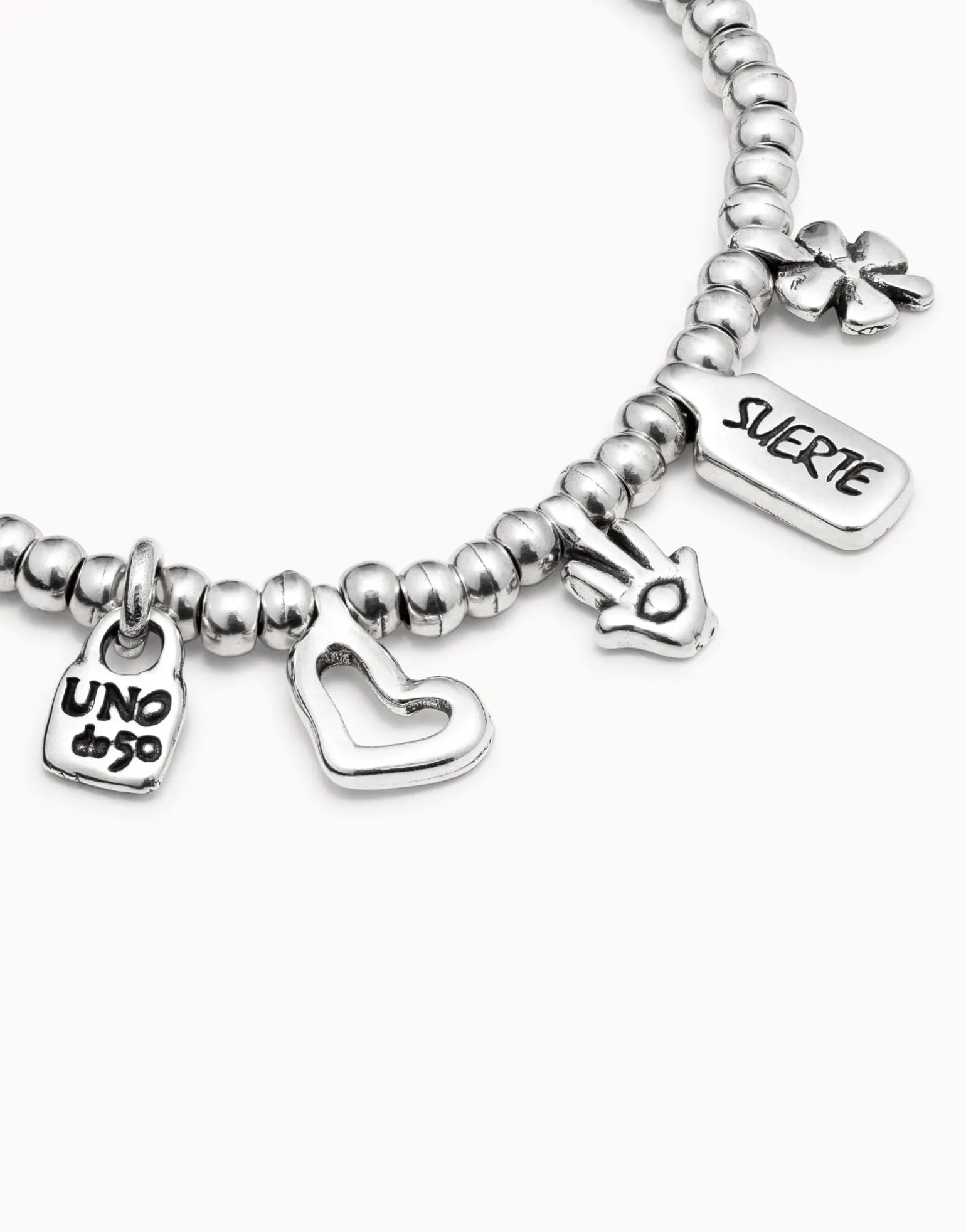 Beaded bracelet with charms