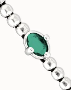 Beaded bracelet with oval faceted green crystal