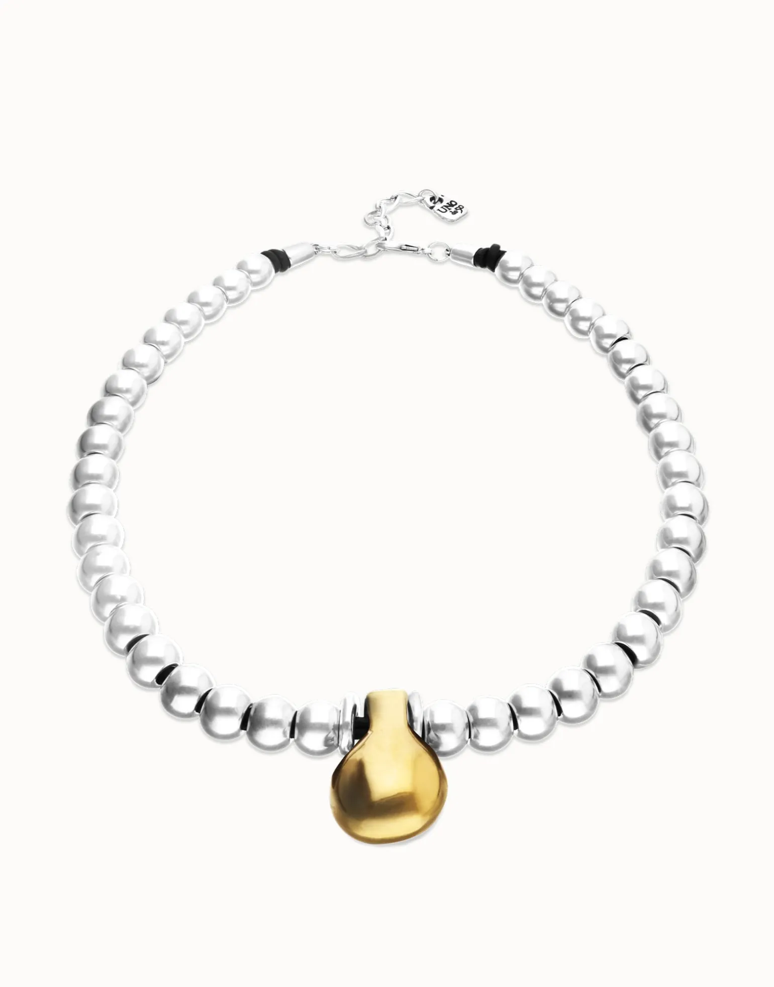 Beaded necklace with medium spheres and a large sphere