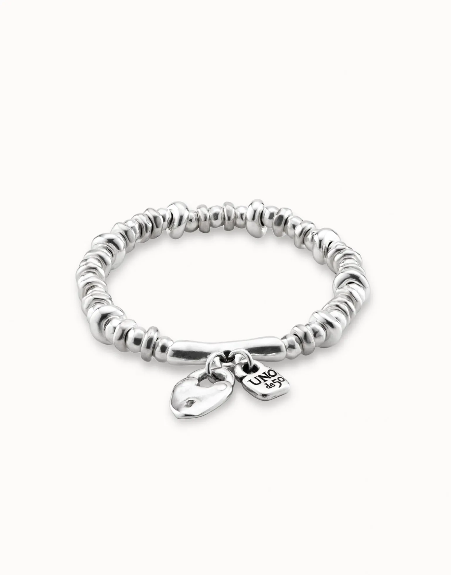 Beaded stretch bracelet with charms