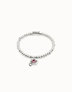 Beaded stretch bracelet with heart and pink crystal