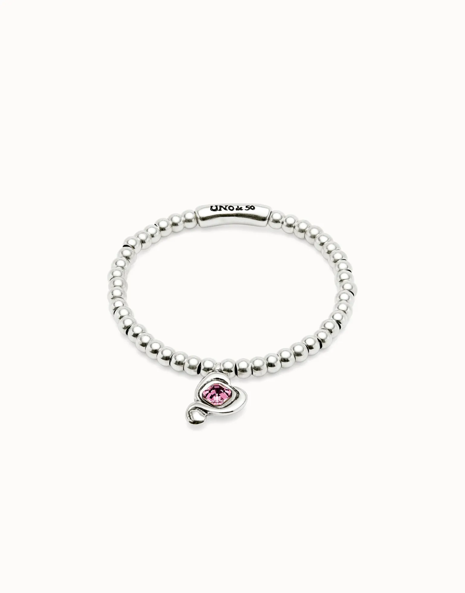 Beaded stretch bracelet with heart and pink crystal