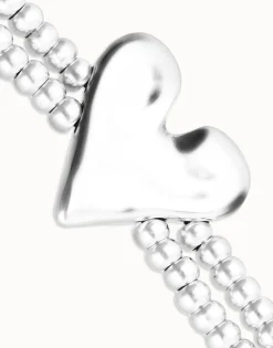 Double elastic bracelet with heart detail