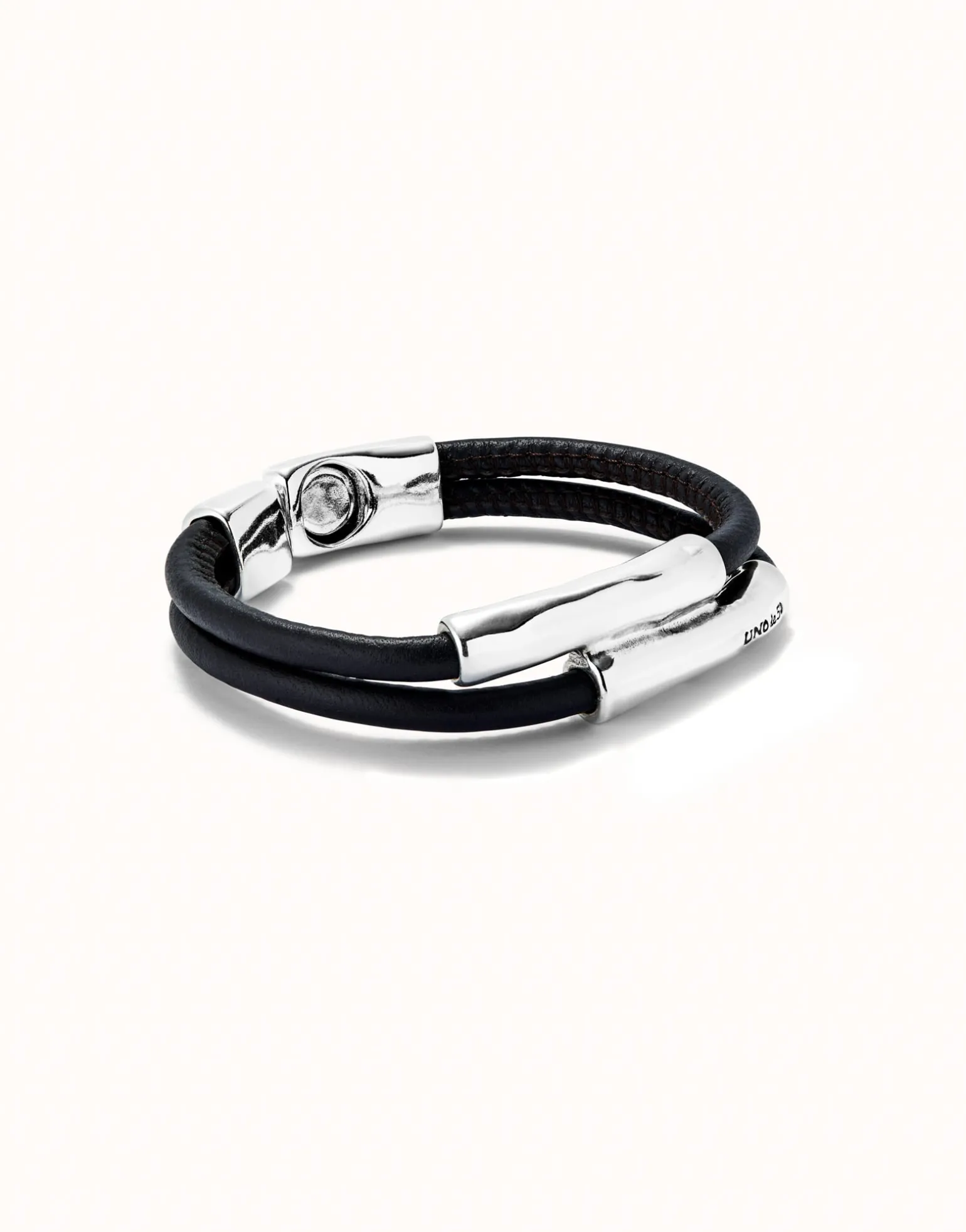Double strand lether bracelet with two tubes