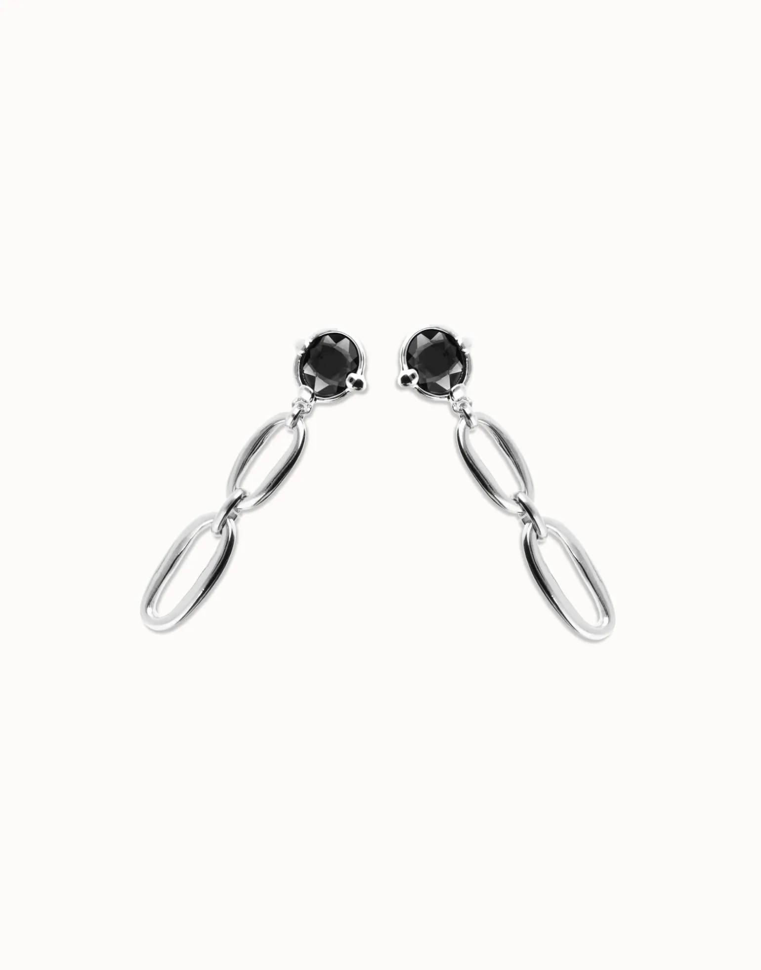 Drop earrings with faceted black crystal and links