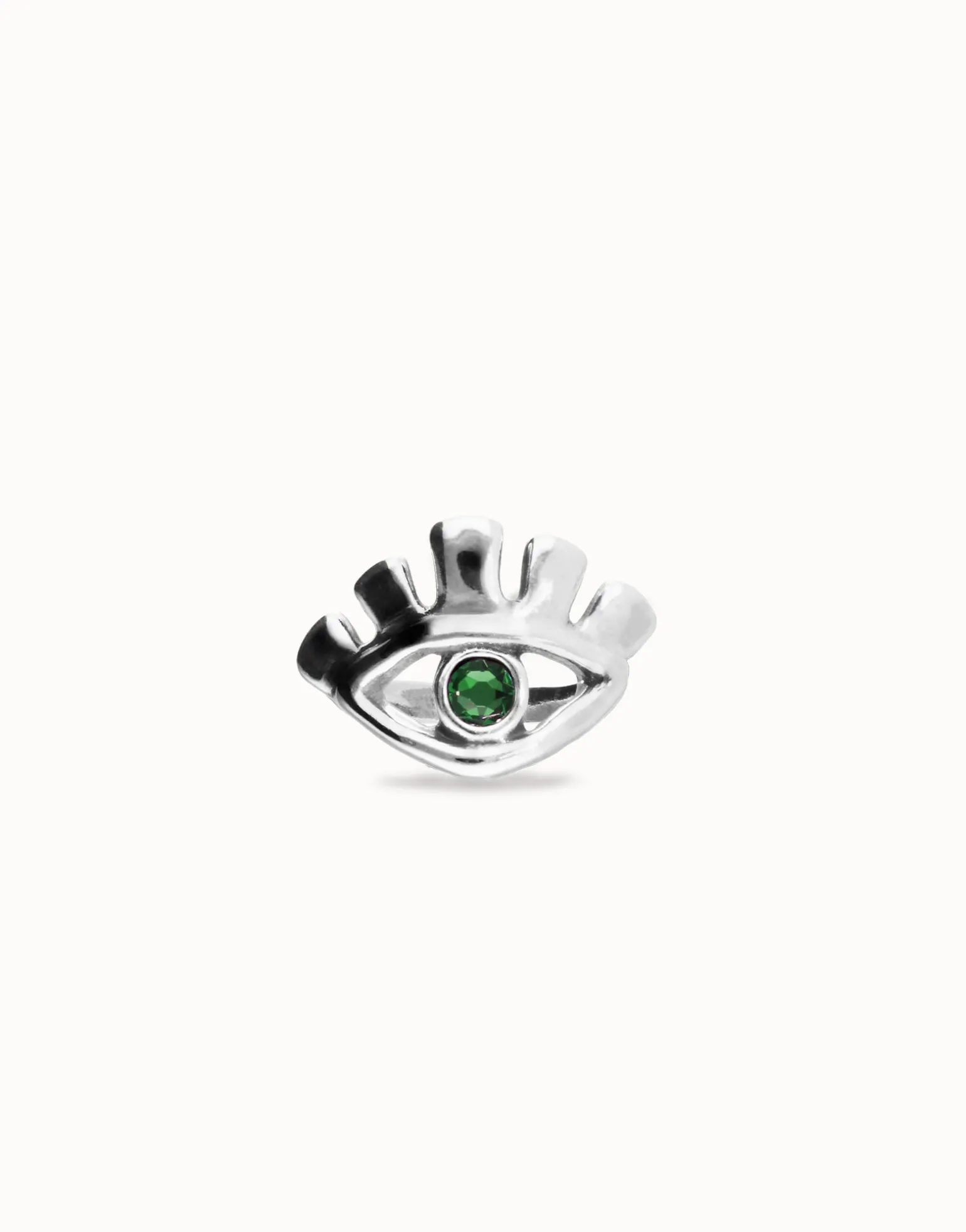 Eye-shaped ring with faceted green crystal