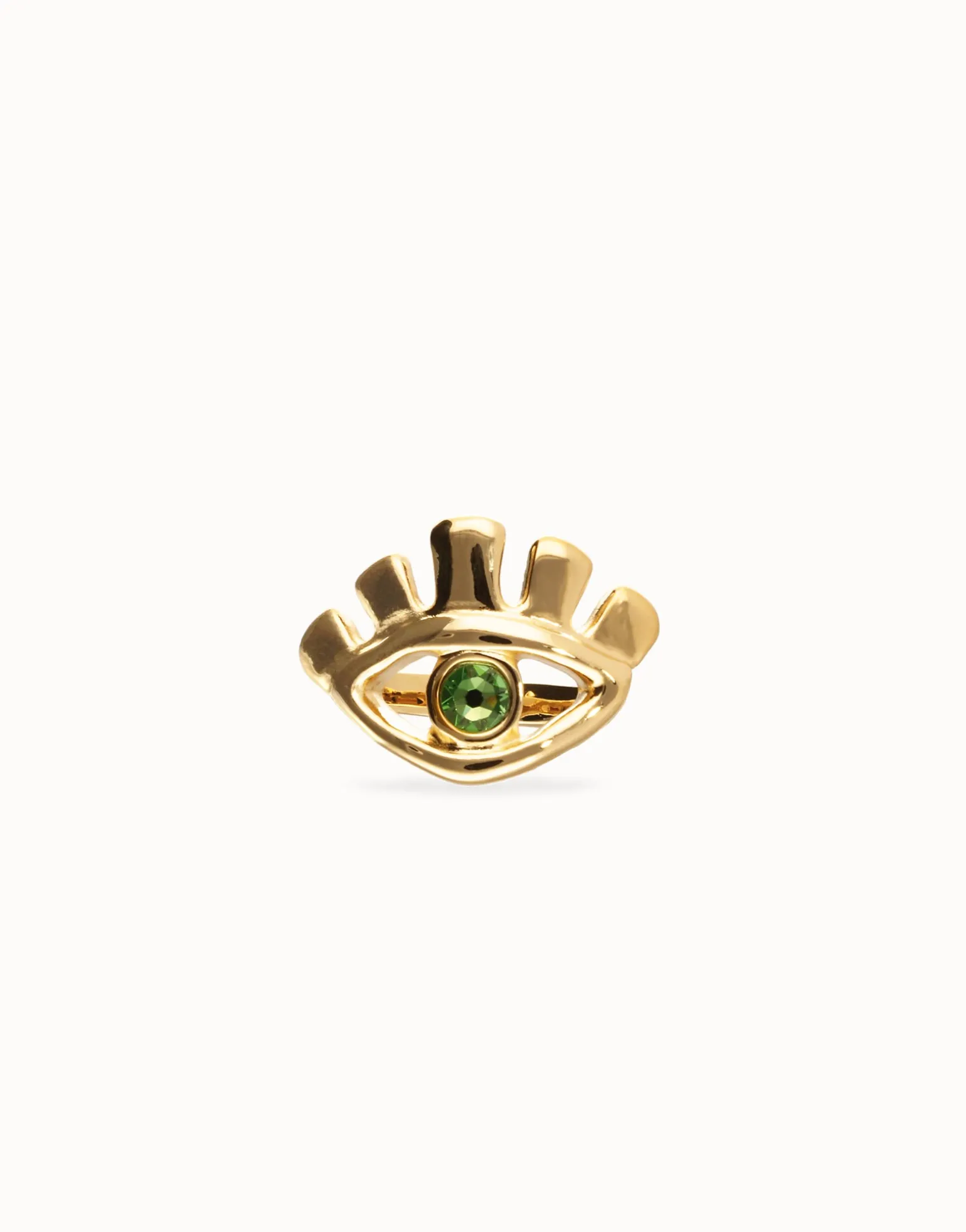 Eye-shaped ring with faceted green crystal