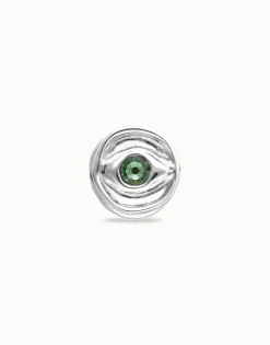 Eye-shaped signet ring with faceted green crystal