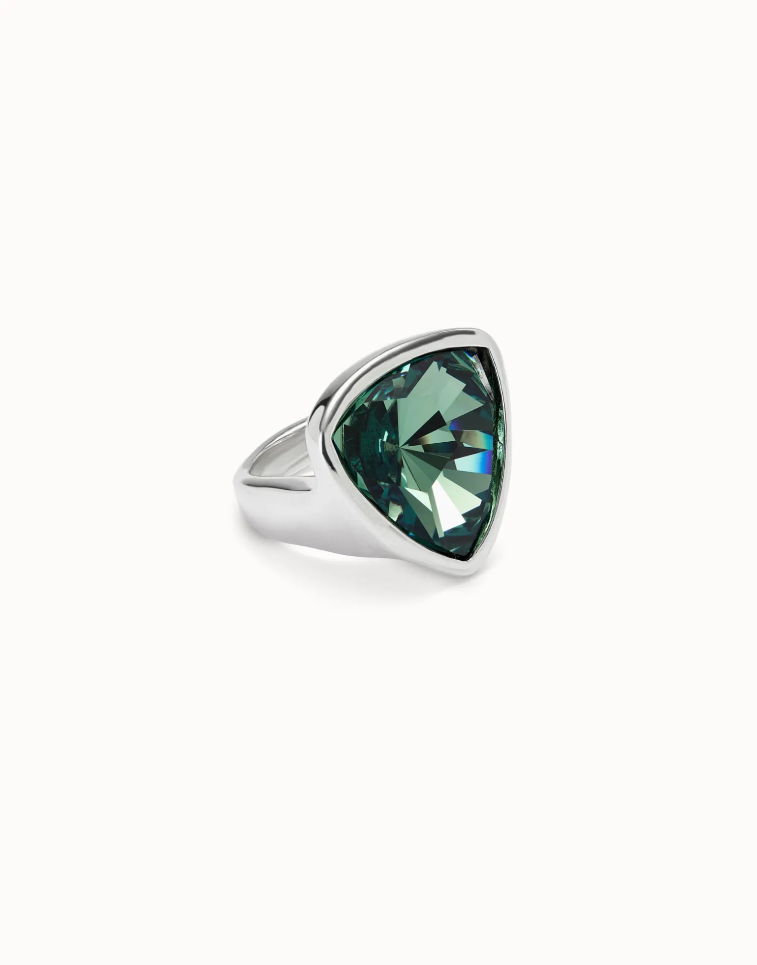 Large triangular ring with crystals