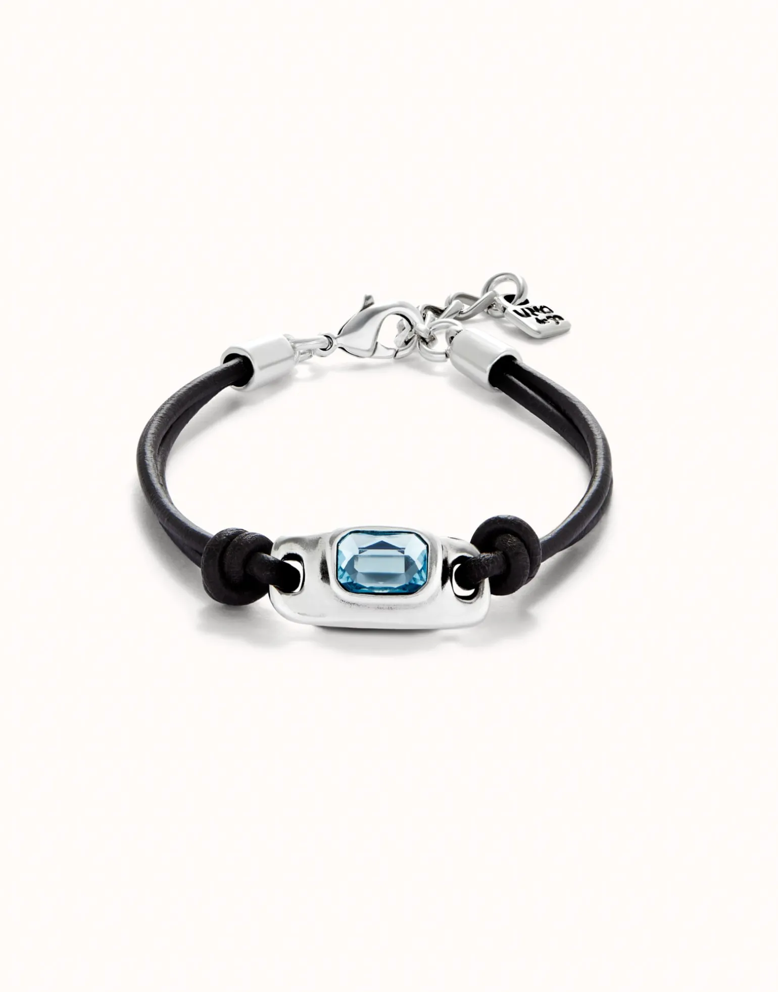 Leather bracelet with a blue crystal