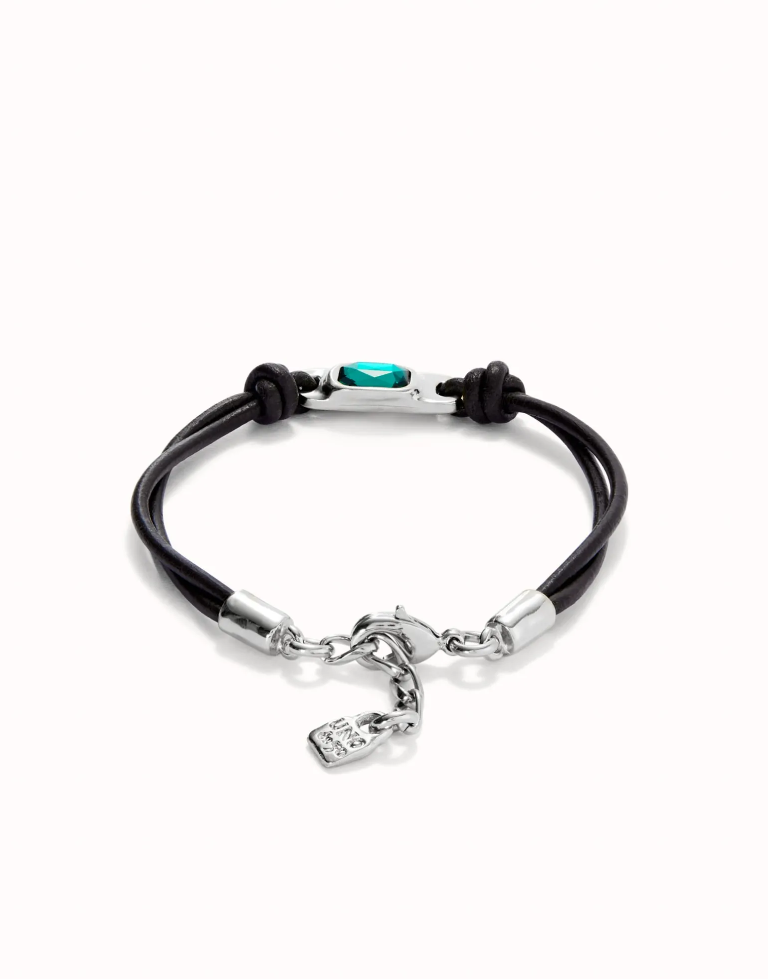 Leather bracelet with a green crystal
