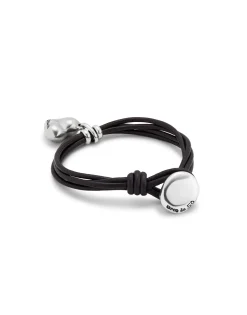 Leather bracelet with a heart charm