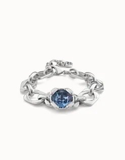 Link chain bracelet with a blue crystal