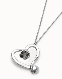 Long chain pendant necklace with a large heart