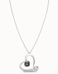 Long chain pendant necklace with a large heart