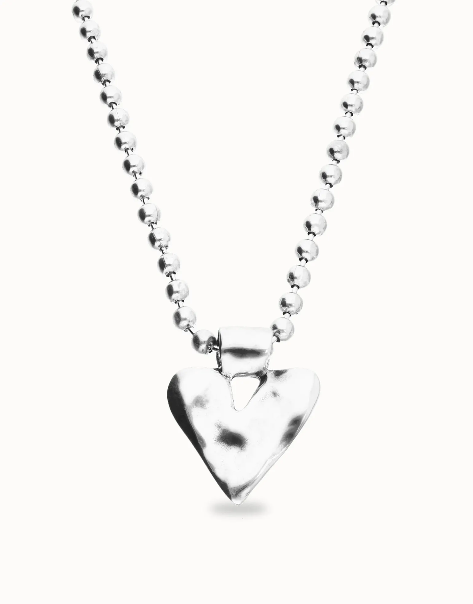 Long necklace with beads and heart detail