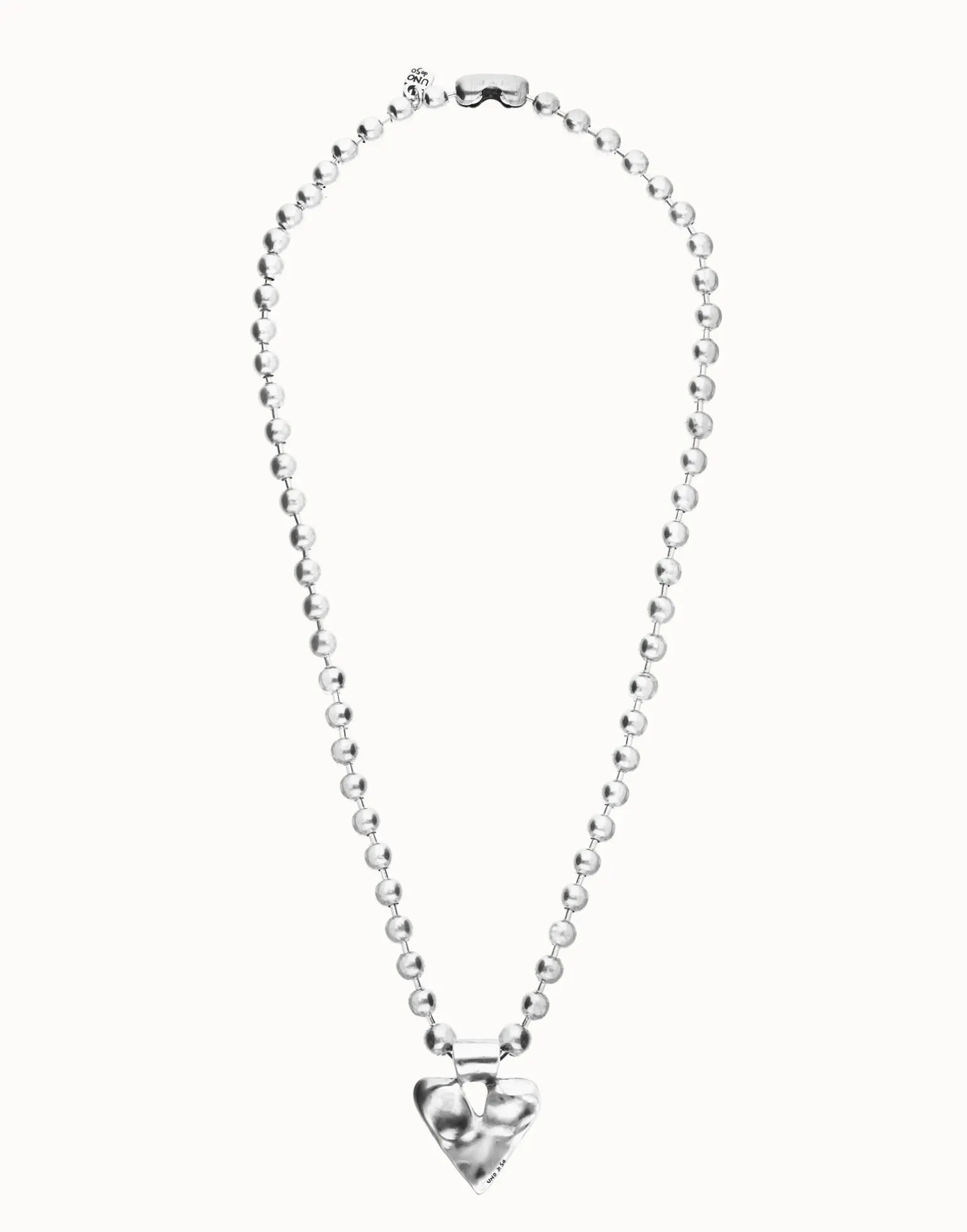 Long necklace with beads and heart detail