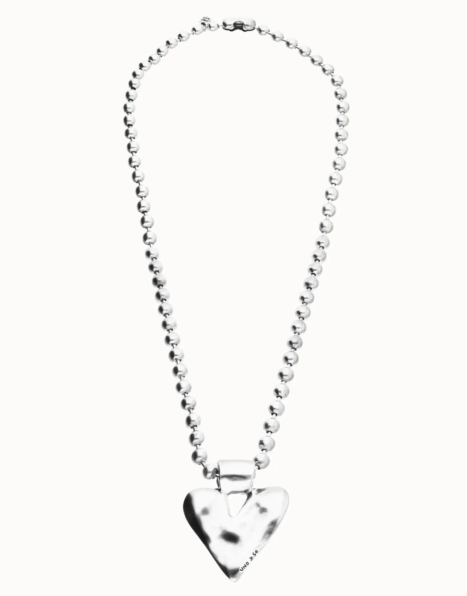 Long necklace with beads and heart detail