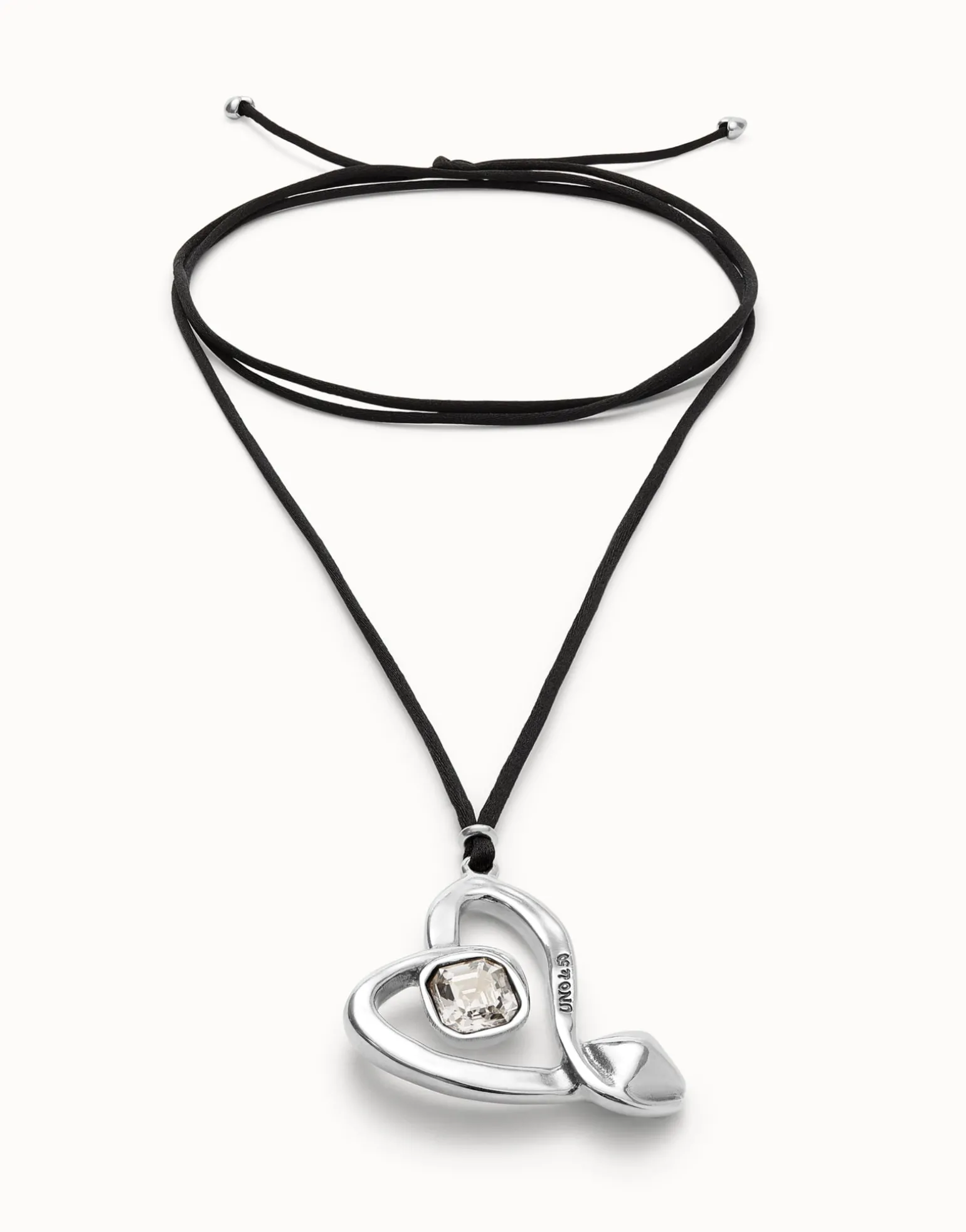 Long pendant and central heart with transparent crystal