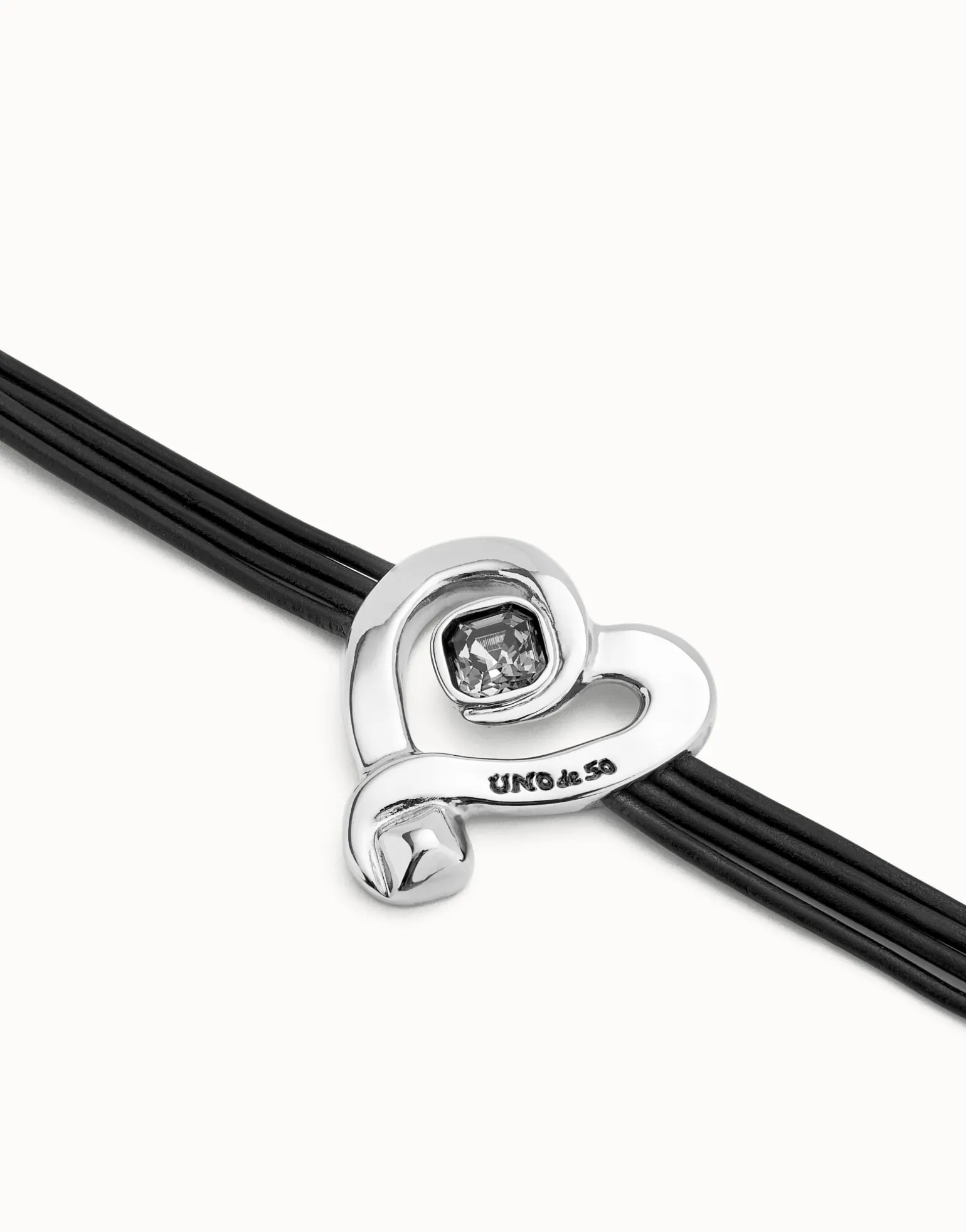 Multi strand leather bracelet with a heart