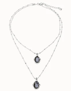 Multi strand necklace with two black oval faceted crystals