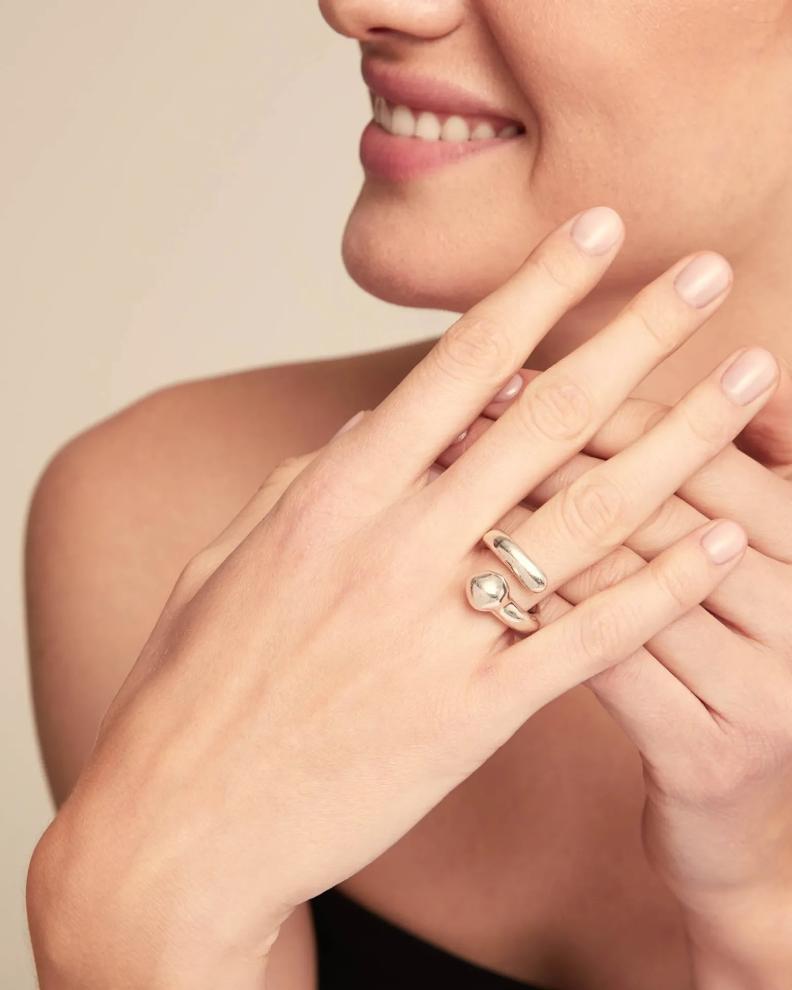 Open organic‑design ring