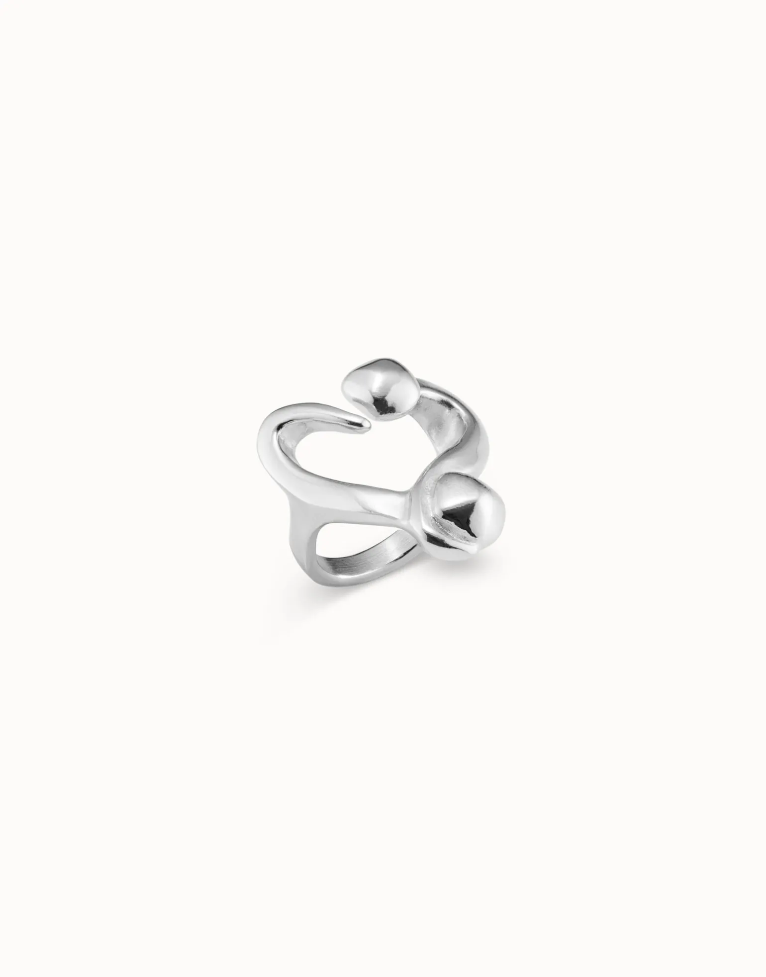 Open ring with a nailed heart