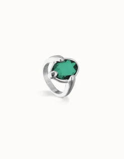 Ring with green oval faceted crystal