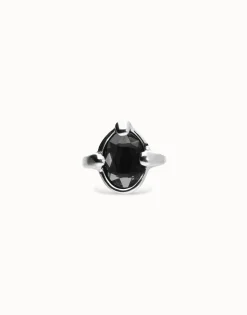 Ring with oval faceted black crystal