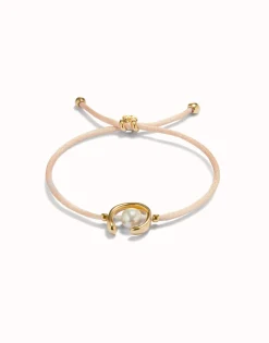 Salmon cord bracelet with a pearl