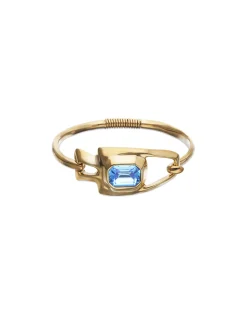 Semi-rigid bracelet with blue faceted crystal