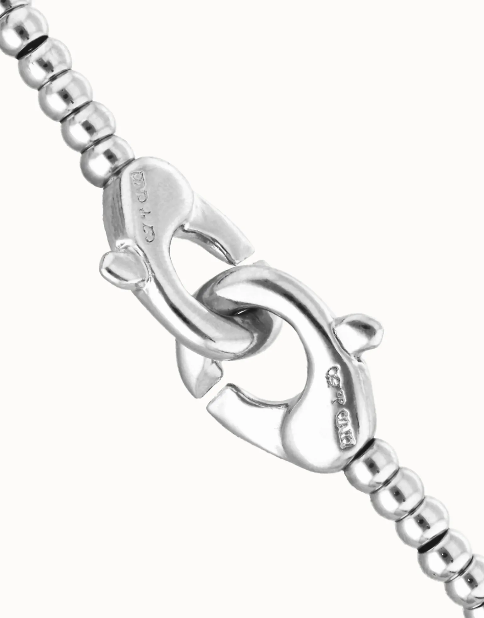 Small beads bracelet with interlocking carabiner