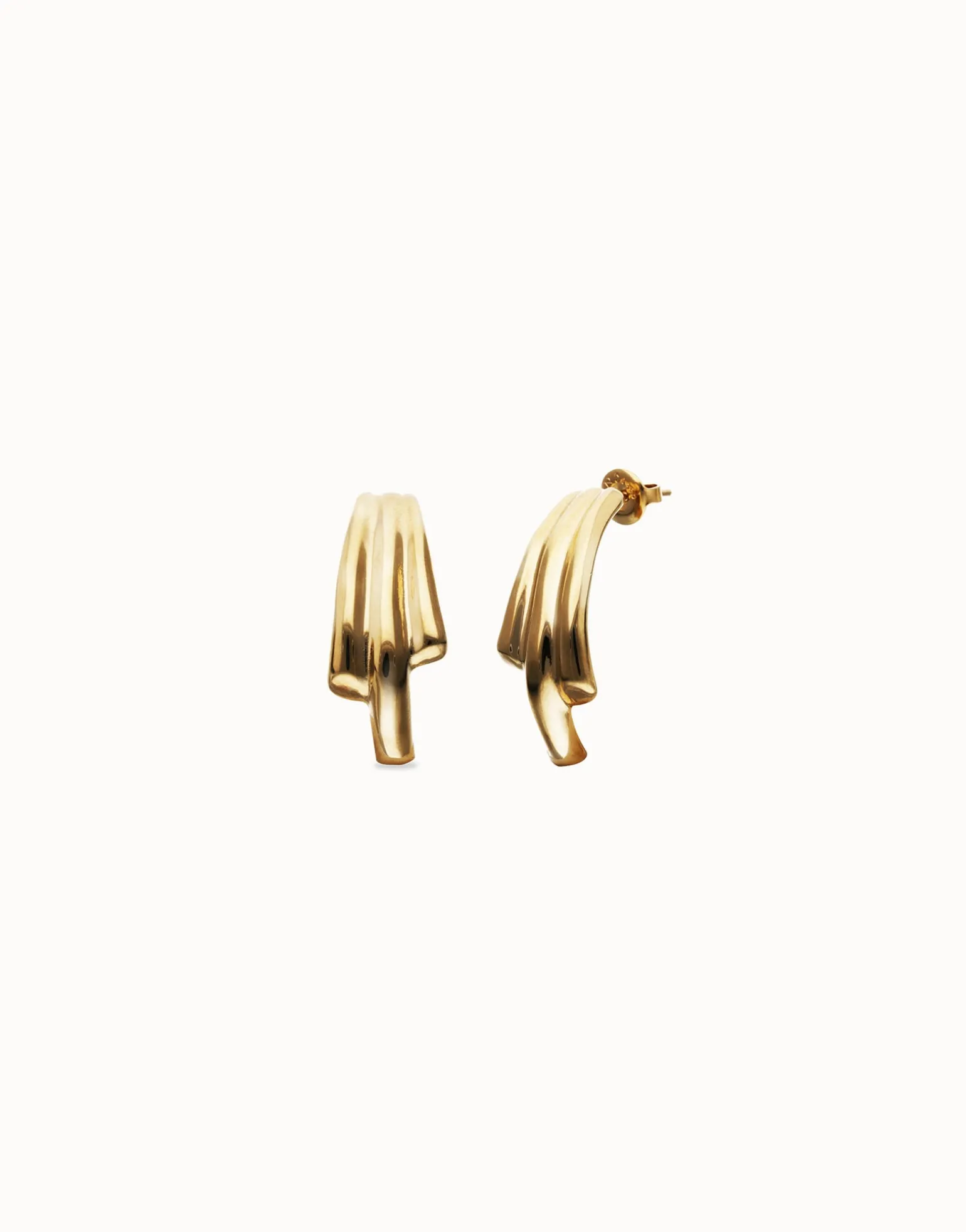 Stud earrings with elongated organic shapes