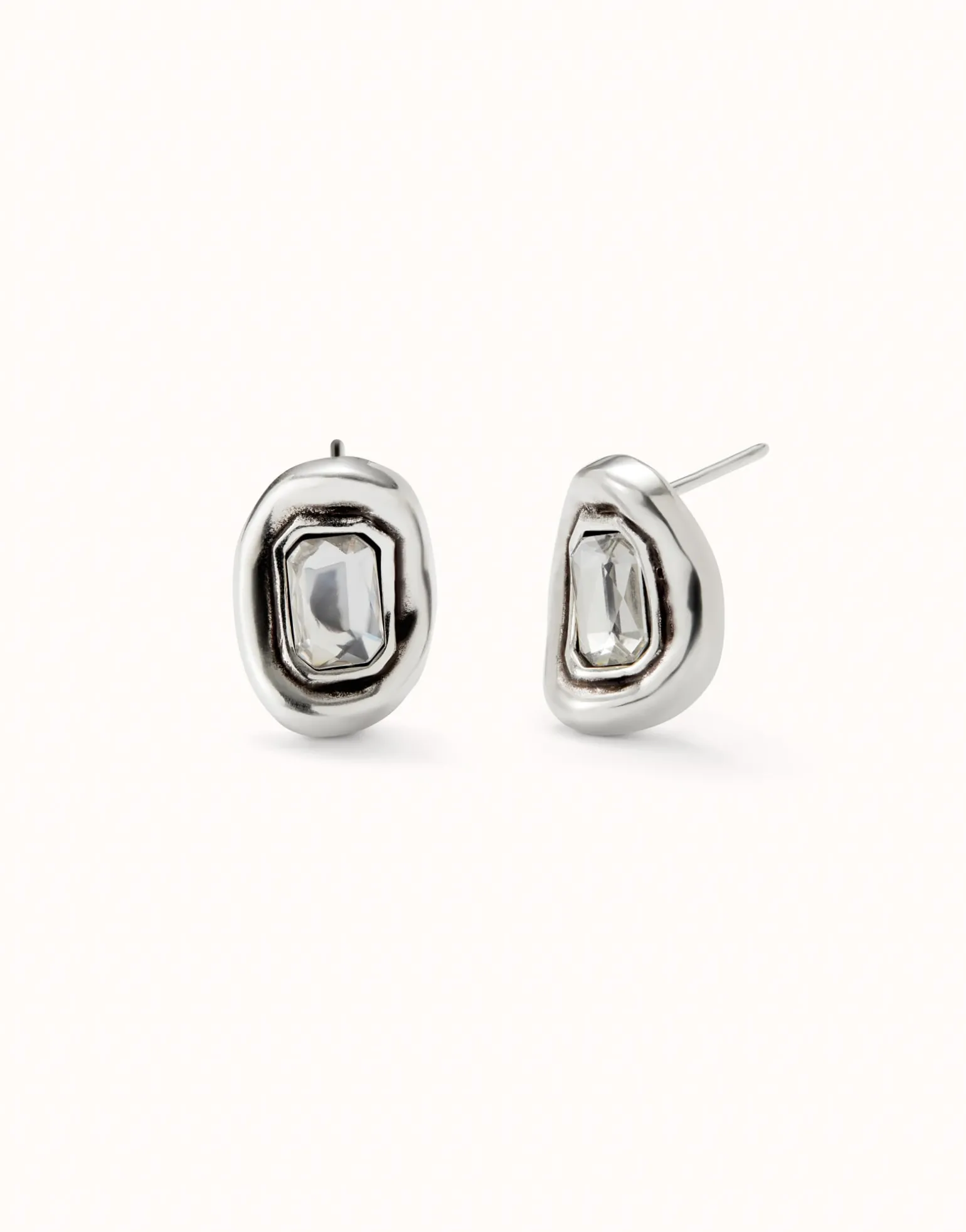 Stud earrings with white faceted crystal