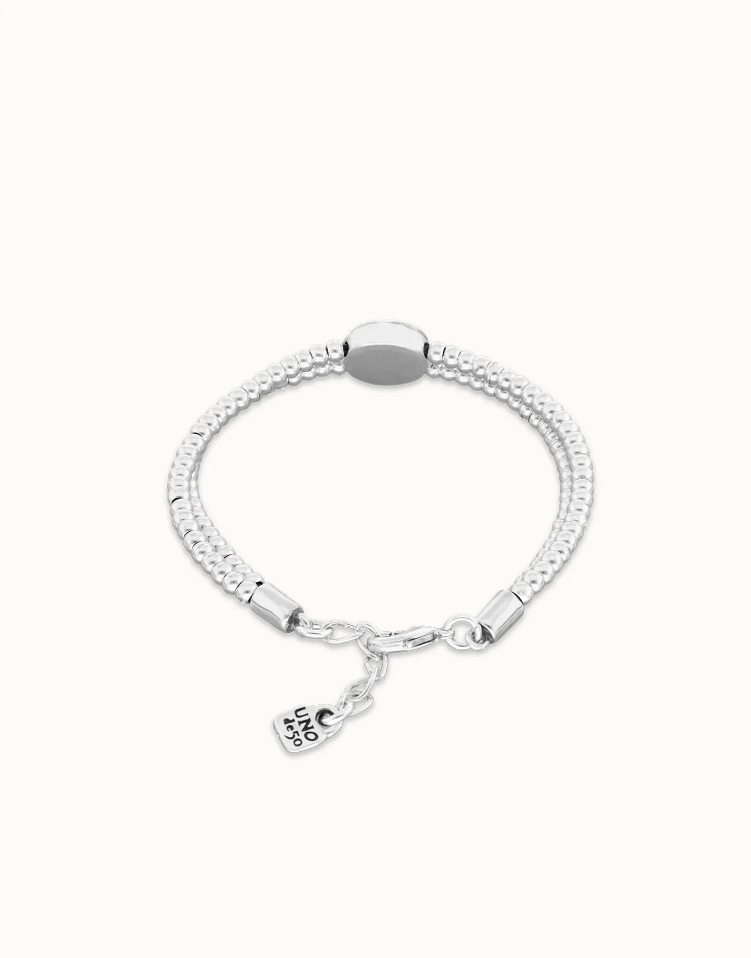 Two-strand beaded bracelet with an eye-shaped charm